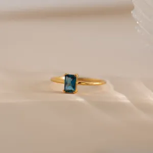 Blue Topaz Emerald Ring