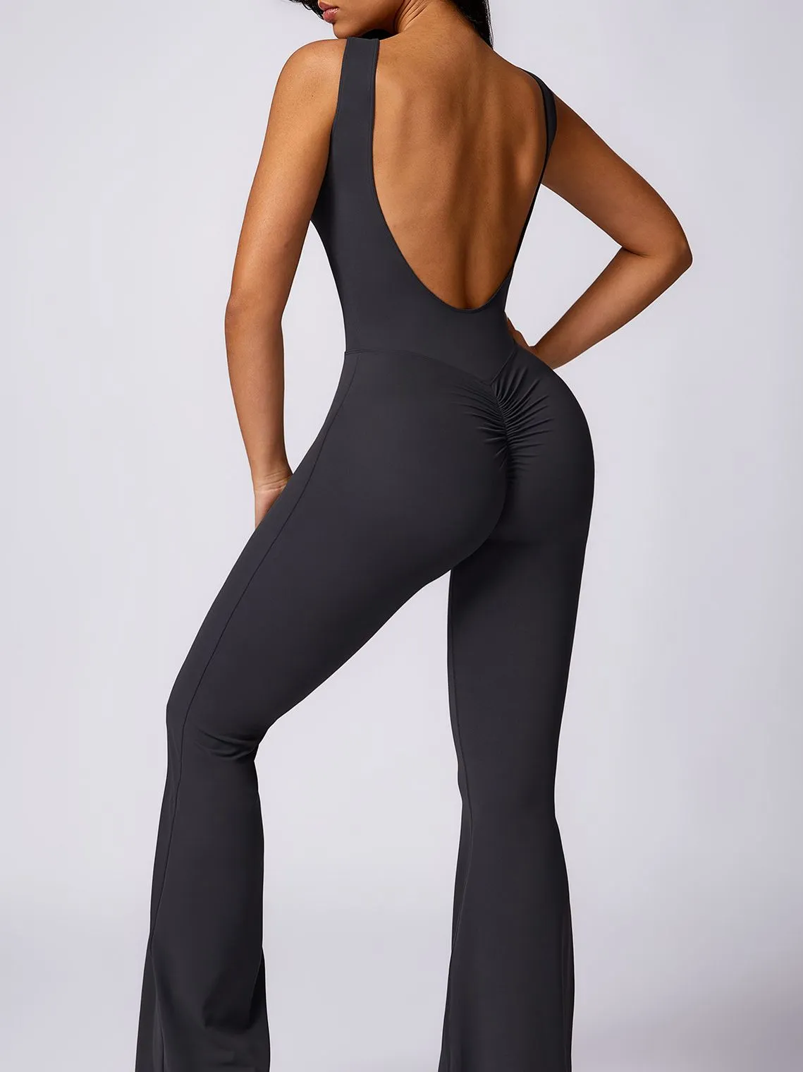 ZASUWA Female Backless Elastic Tight Scrunch Bum Flare Jumpsuit